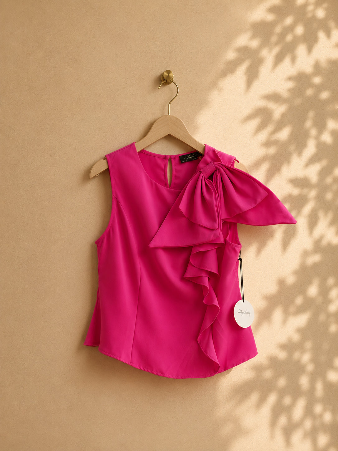 CAMISA ROSADA CON CHONGO A LA IZQ LISA