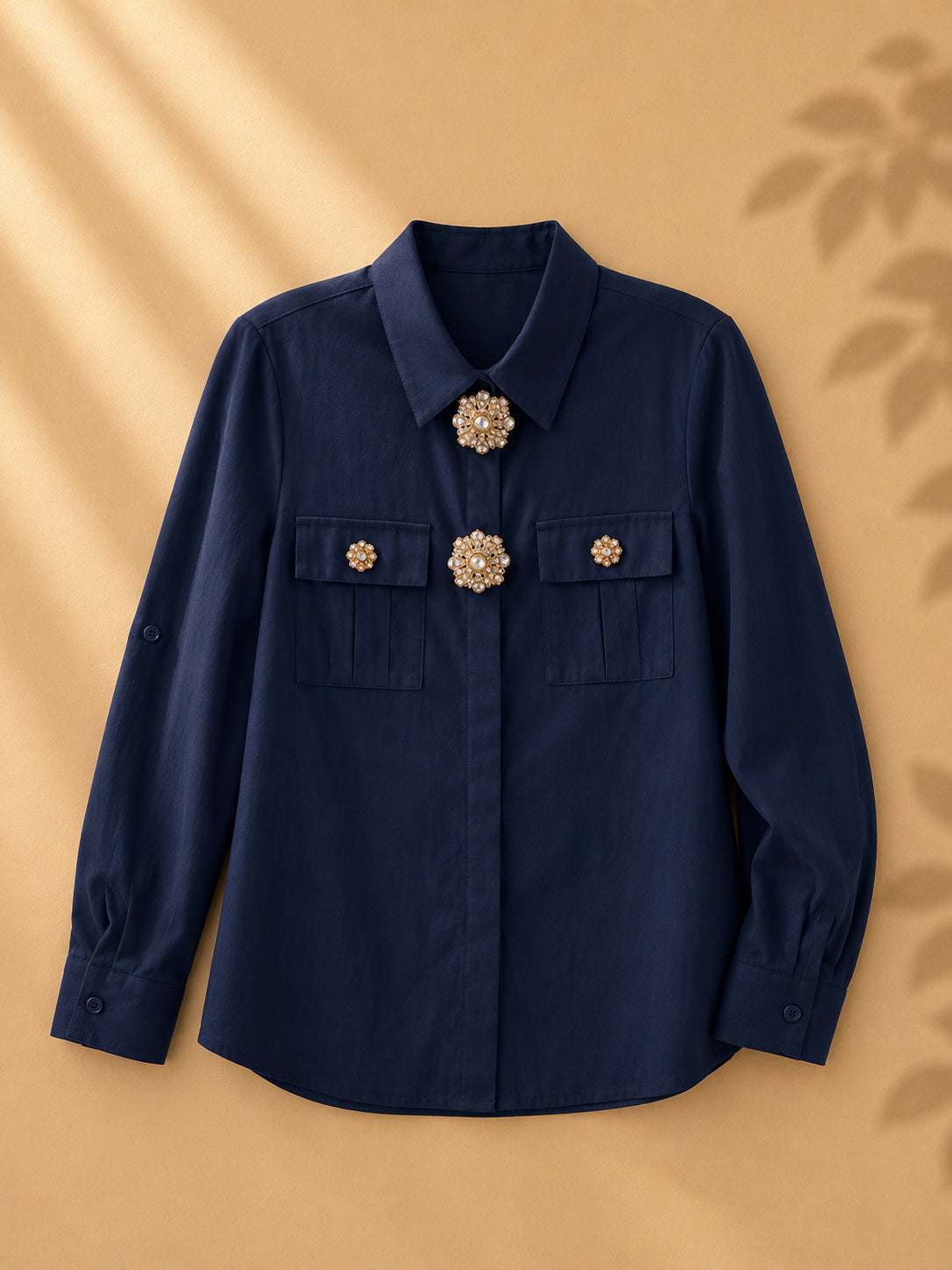 CAMISA AZUL MANGA LARGA CON ACCESORIOS DORADOS CON PERLA