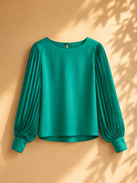 CAMISA VERDE METALIZDO DE MANGAS ANCHAS Y AJUSTADAS A LA MUÑECA