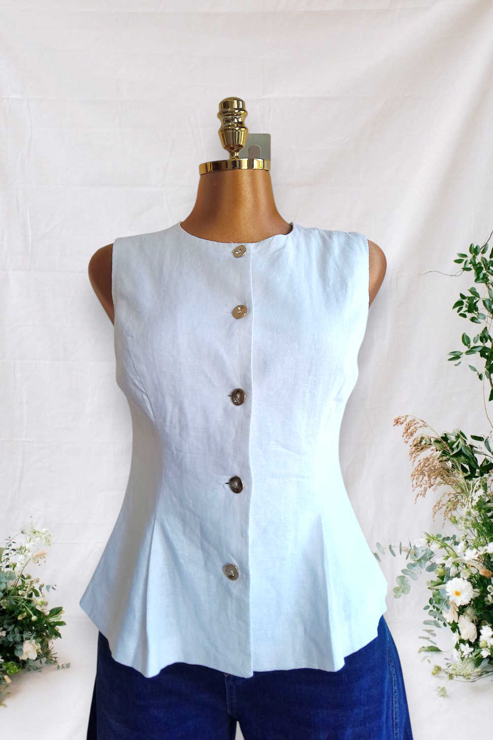 CAMISA DE BOTONES SIN MANGAS