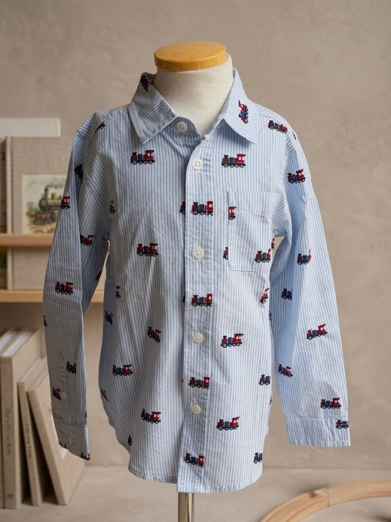 Camisa de botones rayada con trencitos