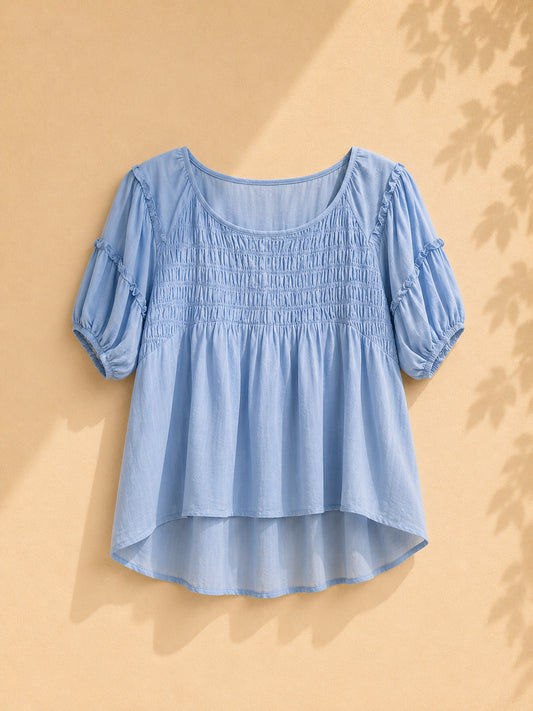 CAMISA CELESTE ELASTICO EN LA PARTE DEL PECHO  LLOVE