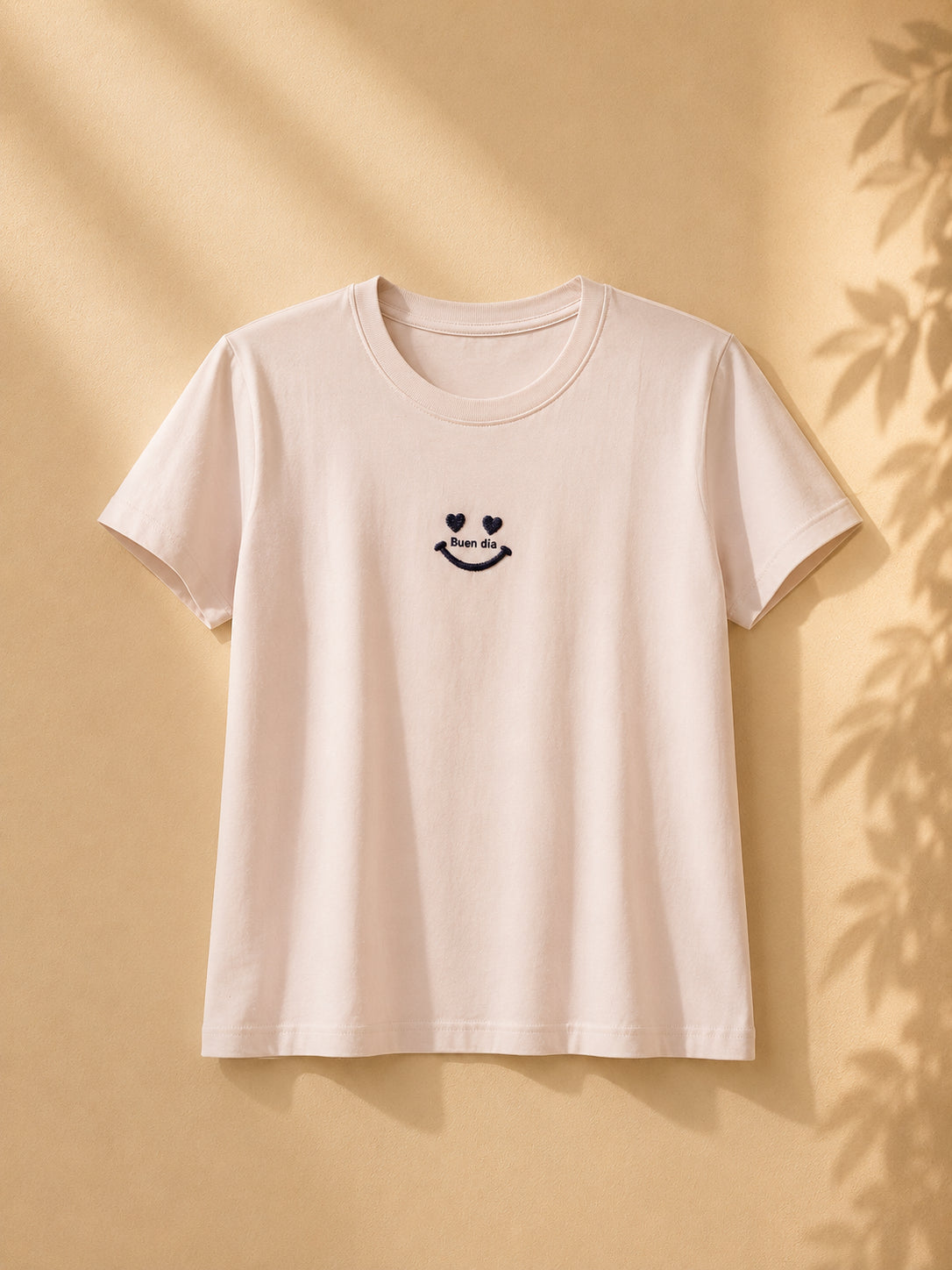 CAMISA GRIS DE CARA SONRIENTE NEGRA
