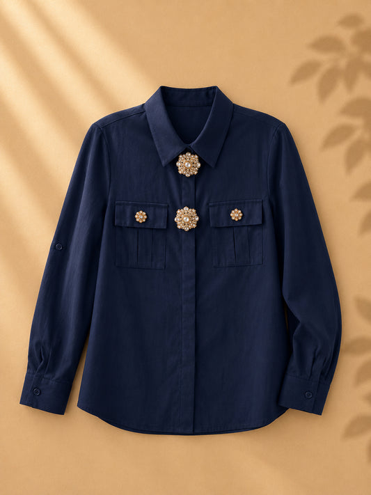 CAMISA AZUL MANGA LARGA CON ACCESORIOS DORADOS CON PERLA